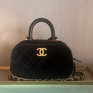 Chanel Black Quilted Mini Bag with Gold Accents